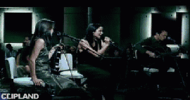 animated gif of The Corrs "Radio (live)" (1999)